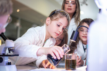Elementary school children doing experiments in the laboratory