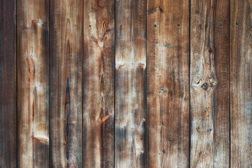 Old rustic rough wood background. Old house wall. Vintage backdrop. Wood planks. Wooden texture background. Old surface