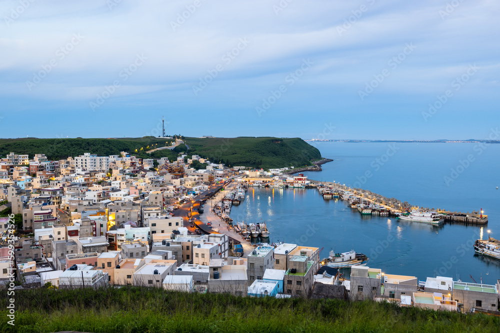 Wall mural Xiyu township fishing village in Penghu of Taiwan at sunset