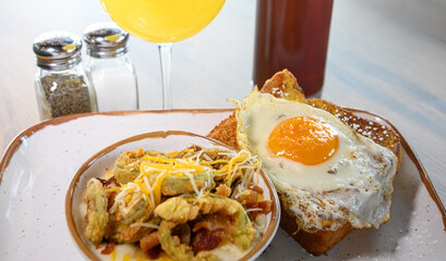 Egg-Topped French Toast with Fried Vegetables and a Mimosa