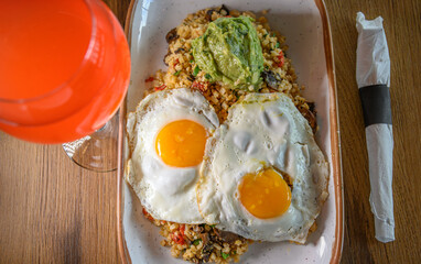 Egg-Topped Quinoa with Guacamole and a Mimosa