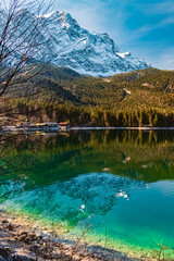 Winter view with reflections at Lake Eibsee, Mount Zugspitze, Wettersteingebirge,...