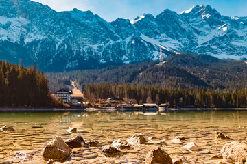 Winter view with rock details and reflections at Lake Eibsee, Mount Zugspitze, Wettersteingebirge,...