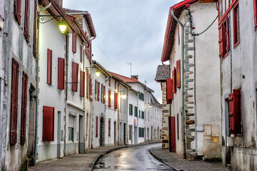 Typical village with white and red houses from the Basque country in France