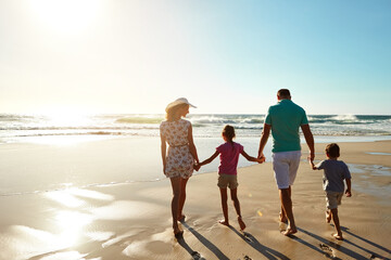 Strengthening family bonds at the beach. a family enjoying some quality time together at the beach.