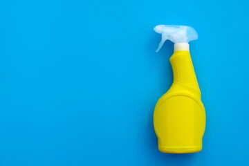 yellow plastic spray detergent bottle isolated on blue background. Packaging template mockup collection. With clipping Path included. Empty space for your text Mock-up plastic bottles. Detergent