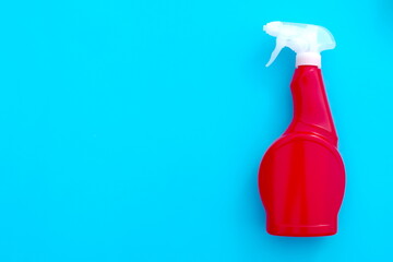  red plastic spray detergent bottle isolated on blue background. Packaging template mockup collection. With clipping Path included. Empty space for your text Mock-up plastic bottles. Detergent