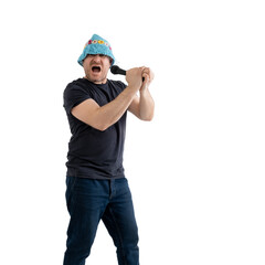 A funny mature man in a bright hat holds a microphone in his hands. Isolated on a white background.