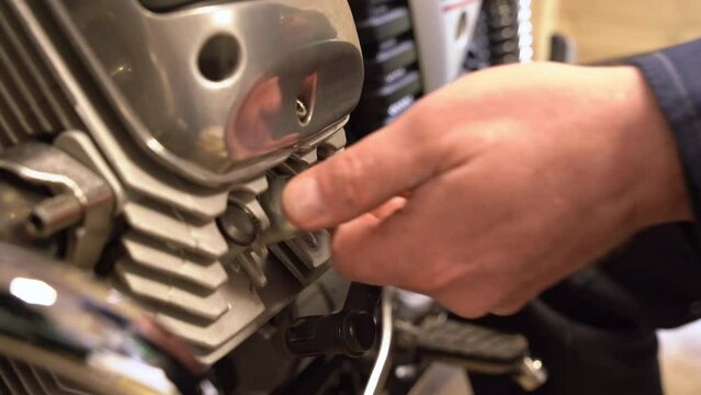 installing the spark plug into the engine
