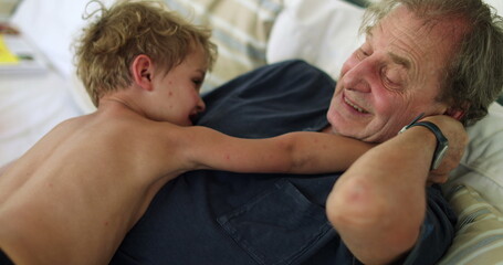 Fototapeta premium Grand-father interaction with grand-child casual and candid