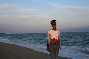 Fototapeta na wymiar African girl on beach