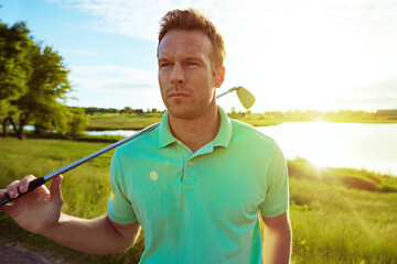 Go golfing or go home. a young man spending the day on a golf course.