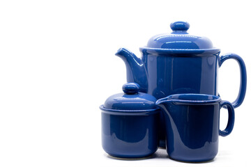 Beautiful vintage cobalt blue porcelain tea set, isolated on white background, selective focus,...
