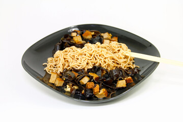 bowl of noodles, black fungus and tofu