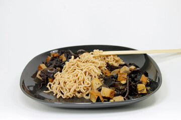 bowl of noodles, black fungus and tofu
