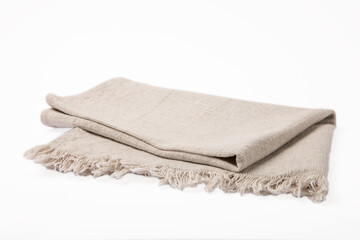 Fototapeta na wymiar Kitchen towel .Cotton napkin isolated on white background. Picnic towel. Home textiles. Folded cloth.Food serving design element. Square napkin.
