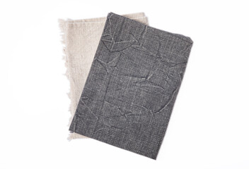 Kitchen towel .Stack of napkins isolated on white background. Picnic towel. Home textiles. Folded cloth.Food serving design element. Square napkin.