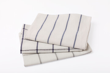 Kitchen towel .Stack of napkins isolated on white background. Picnic towel. Home textiles. Folded cloth.Food serving design element. Square napkin.