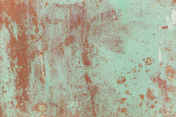 Rusty metal surface with old faded paint. Texture of rust and paint. Grunge background