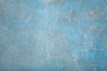 Fototapeta premium Blue concrete surface with old faded paint. Old cement texture