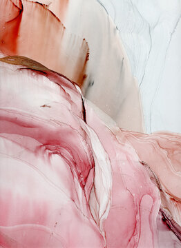 Abstract pink art with beige and gold &mdash; pink background with brown, beautiful smudges and stains made with alcohol ink and golden pigment. Pink fluid art texture resembles watercolor or aquarelle.