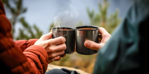 Selbstklebende Fototapeten Friends toasting coffee during camping in forest  © Viks_jin