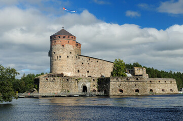 The Olavinlinna Castle In Savonlinna Finland On A Beautiful Sunny Summer Day With A Few Clouds In The Blue Sky