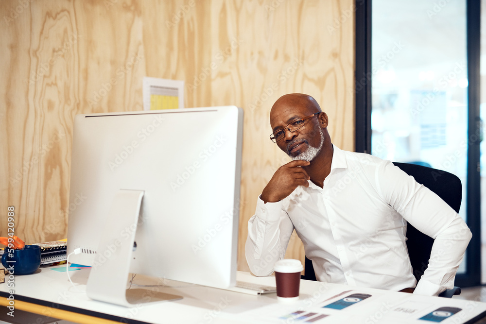 Poster youll only gain experience through hard work and staying focused. a mature businessman working on a 