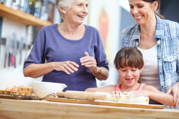 They all love baking. a three generational family baking together.