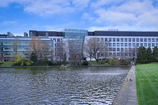 Campus of University College, Dublin, with modern buildings and ornamental pond