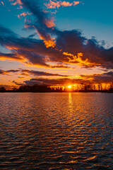 Sunset with reflections near Plattling, Isar, Bavaria, Germany
