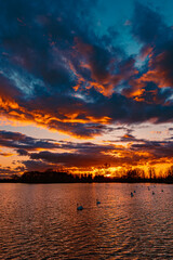 Sunset with reflections near Plattling, Isar, Bavaria, Germany
