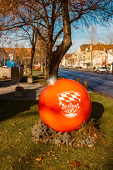 Winter view on a sunny day wit a huge Christmas tree ball ornament at Plattling, Isar, Bavaria,...