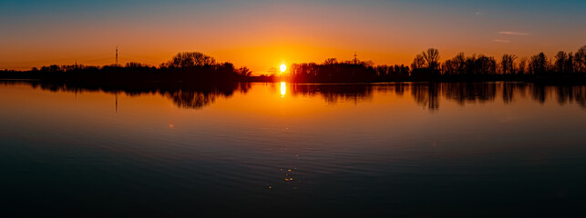 Sunset with reflections near Plattling, Isar, Bavaria, Germany