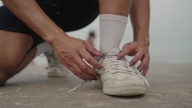 LGBT Queer Gay Man Male Tying Shoes Laces