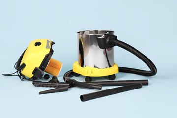 Fototapeta premium Vacuum cleaner on blue background