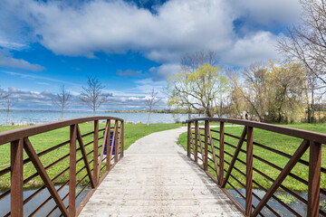 Discover the breathtaking beauty of Keswick's Claredon Beach Park with these stunning 45MP photos. The collection showcases the picturesque views of Lake Simcoe, verdant green grass.