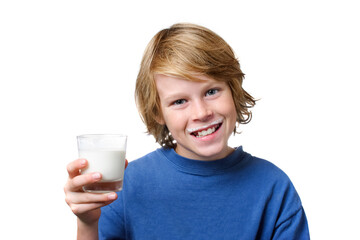 Smiling boy with a glass of milk