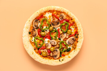 Vegetable pizza on beige background