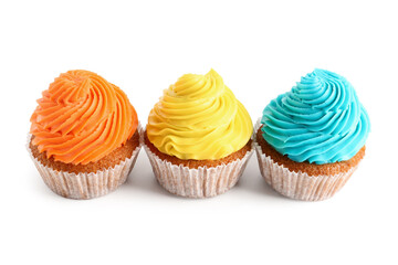 Tasty colorful cupcakes on white background