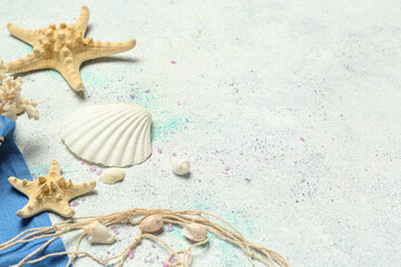 Naklejka na ściany i meble Sea shells with starfishes on grunge background, closeup