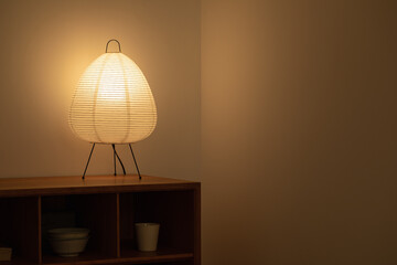 Lamp on the table. indoor atmosphere. A corner of the warm room.