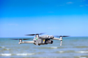 Aerial equipment Drone with Digital Camera on the mountain background.Technology concept