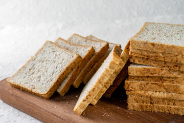 bread 2 kind : have yeast bread like pasties, buns, rye pretzel sourdough croissant tortilla and and no yeast of cereal bakery is leavened on old wooden background.