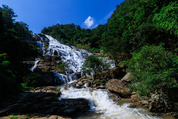 Fototapeta na wymiar wide angle shot, Mea Ya Waterfall in the rain season at Doi Inthanon National park, north of Chiang Mai Province, Thailand