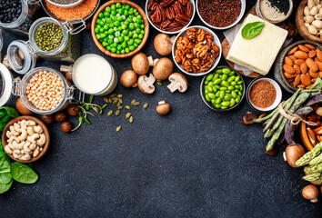 Vegan protein Plant based vegetarian food sources. Healthy eating, diet ingredients: legumes, beans, nuts, alternative milk, tofu, vegetables, seeds and sprouts. Food background. Top view