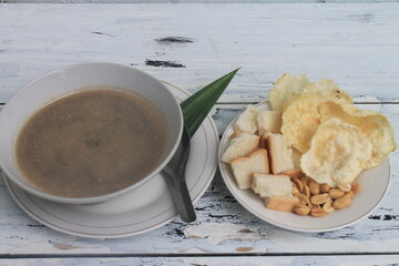 Indonesian traditional drink called wedang roti in a bowl on the table