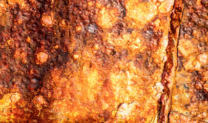 Obraz na płótnie Canvas background of old rusty metal with holes