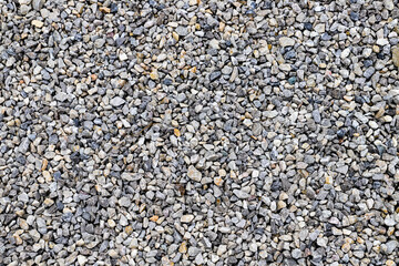 A close up of a pile of small pebbles