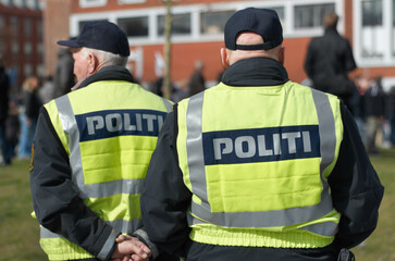Safety, protection and security with police officer in city for peace, law enforcement and...